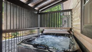 Two Bedroom Gatlinburg Cabin Vacation Rental near Rocky Top Sports World and Downtown Gatlinburg Once in a Blue Moon